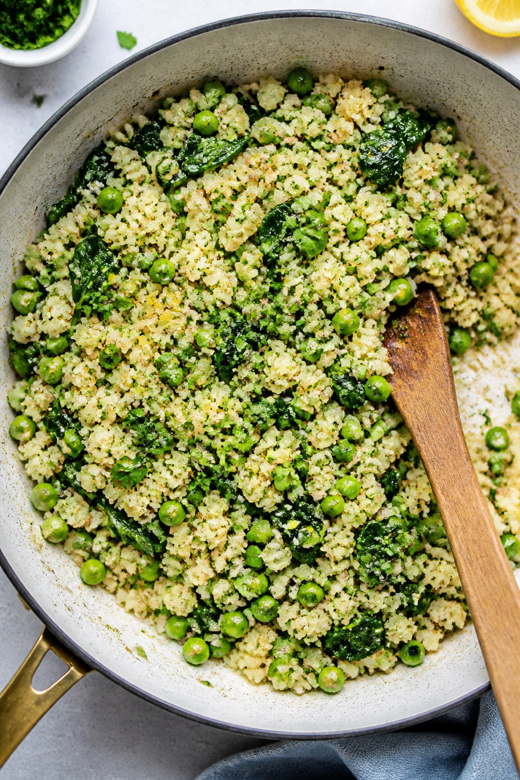 Tasty top view, overhead: Overhead shot of fluffy cauliflower rice cooked in garlic, shallot, and bu