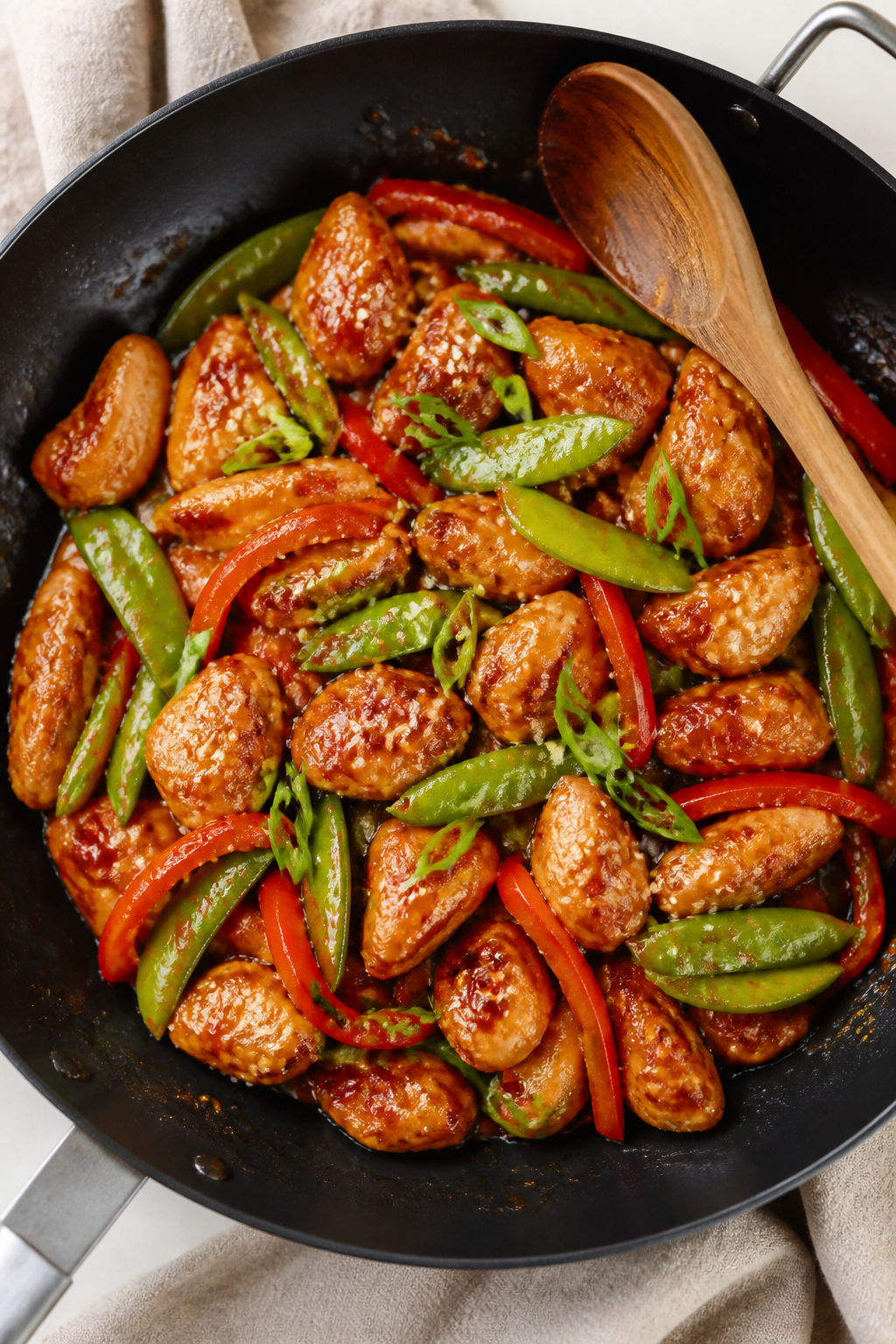 Tasty top view, overhead shot: Overhead shot of sweet chili chicken skillet served family-style in a